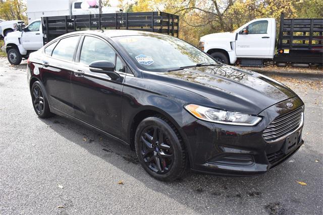 used 2014 Ford Fusion car, priced at $5,711