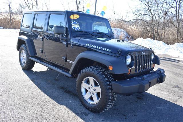 used 2012 Jeep Wrangler Unlimited car, priced at $14,410