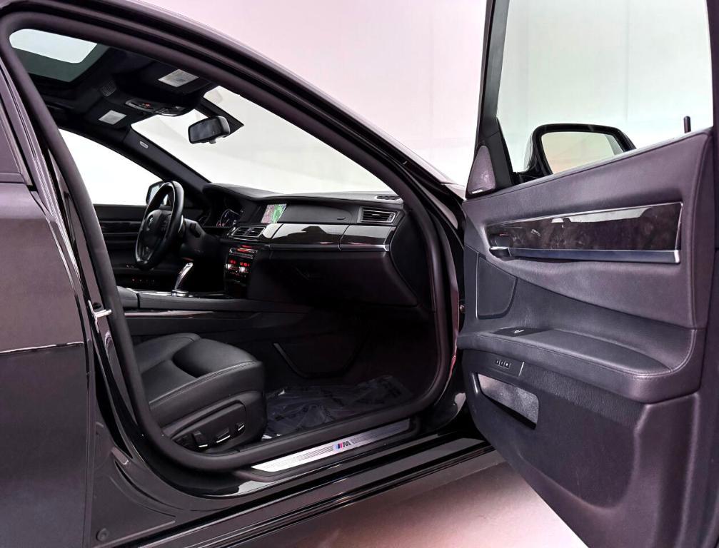 used 2015 BMW 740 car, priced at $13,900