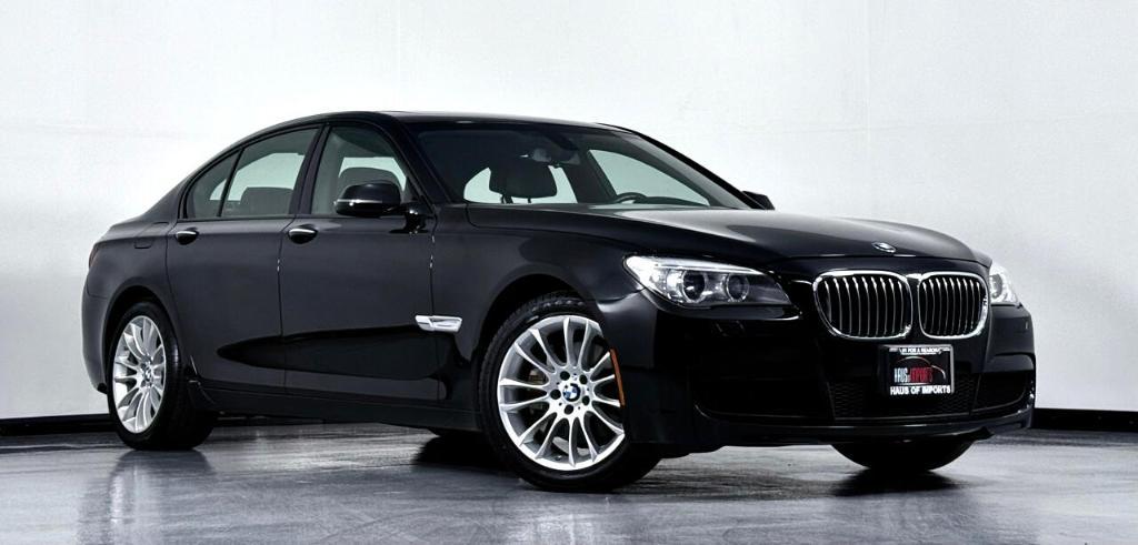 used 2015 BMW 740 car, priced at $13,900