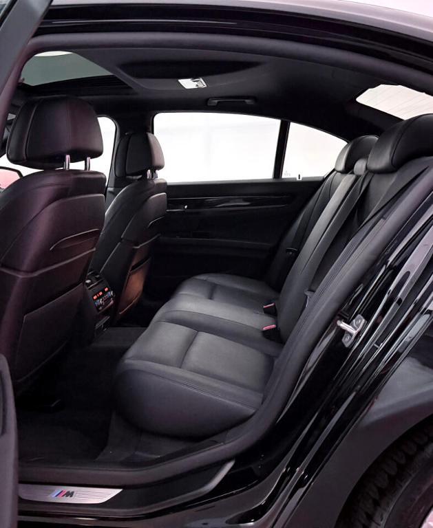 used 2015 BMW 740 car, priced at $13,900