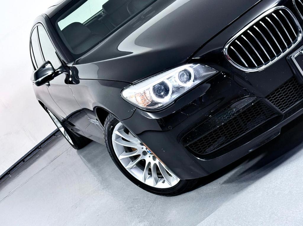 used 2015 BMW 740 car, priced at $13,900