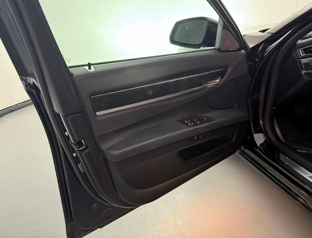 used 2015 BMW 740 car, priced at $13,900