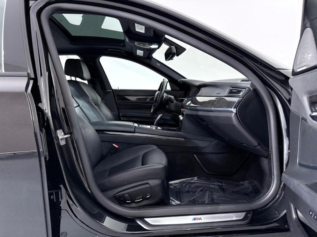 used 2015 BMW 740 car, priced at $13,900