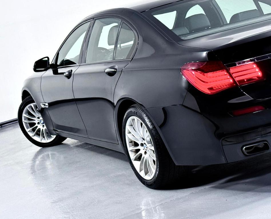 used 2015 BMW 740 car, priced at $13,900