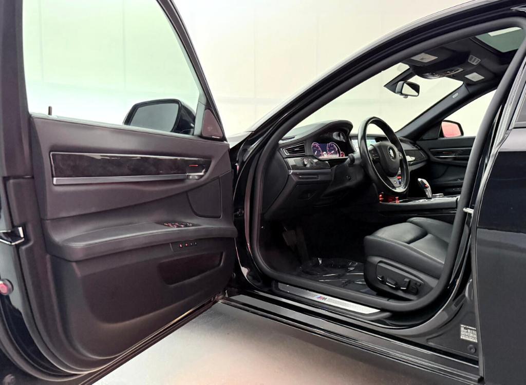 used 2015 BMW 740 car, priced at $13,900
