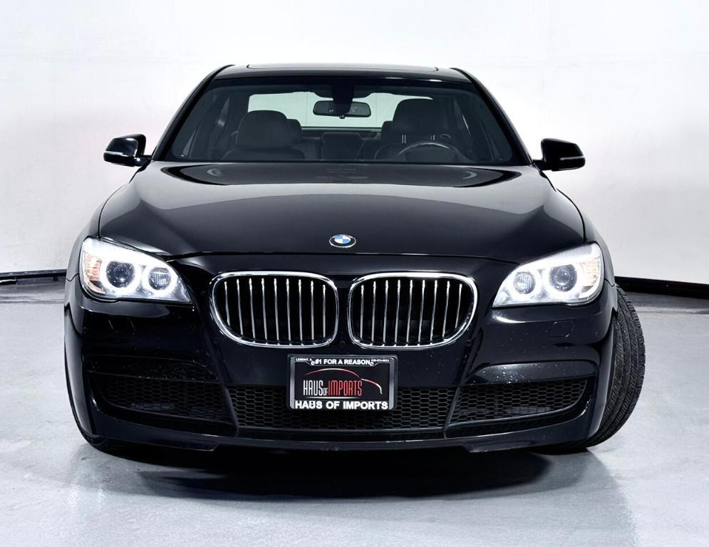 used 2015 BMW 740 car, priced at $13,900