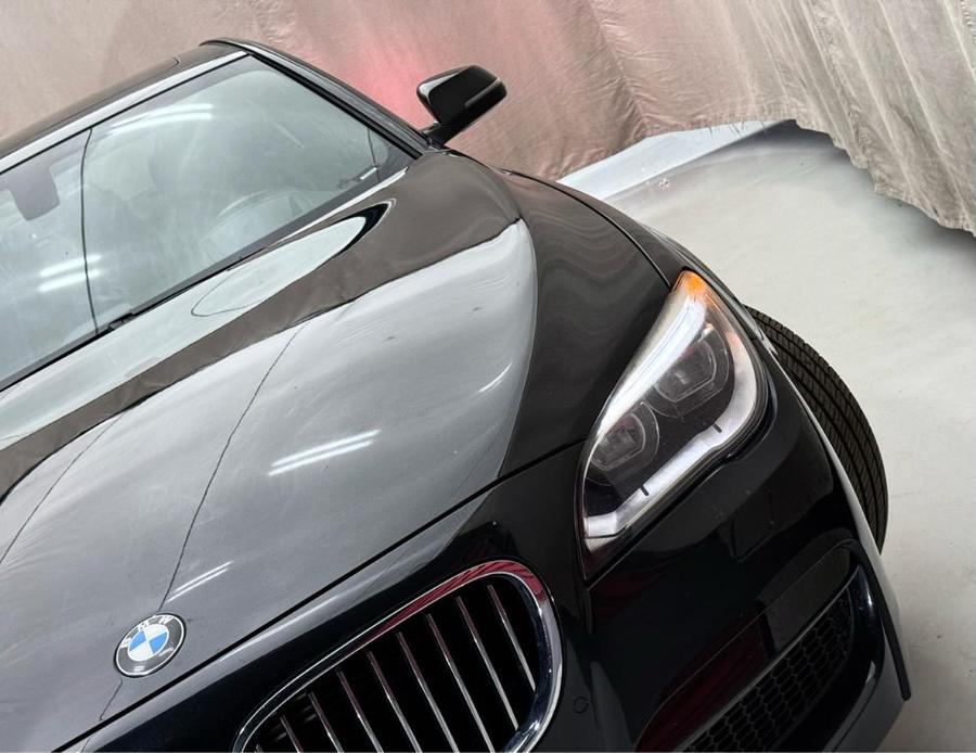 used 2014 BMW 750 car, priced at $18,500