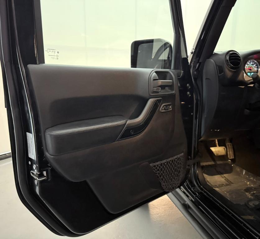 used 2015 Jeep Wrangler Unlimited car, priced at $19,300