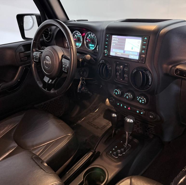 used 2015 Jeep Wrangler Unlimited car, priced at $19,300