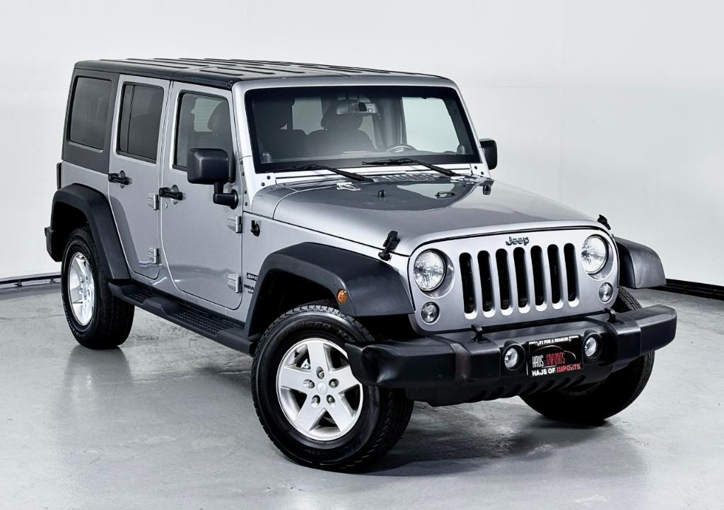 used 2014 Jeep Wrangler Unlimited car, priced at $12,400