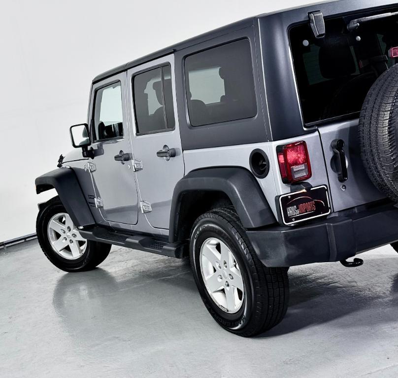 used 2014 Jeep Wrangler Unlimited car, priced at $12,400