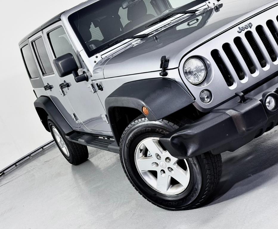 used 2014 Jeep Wrangler Unlimited car, priced at $12,400