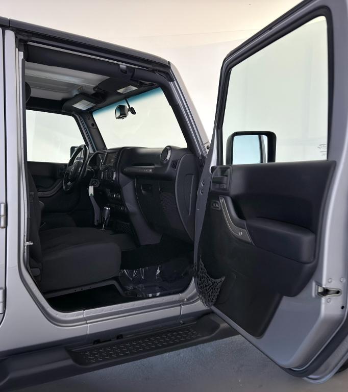 used 2014 Jeep Wrangler Unlimited car, priced at $12,400