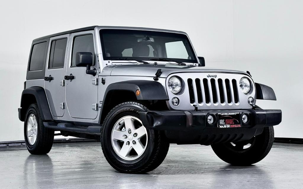 used 2014 Jeep Wrangler Unlimited car, priced at $12,400