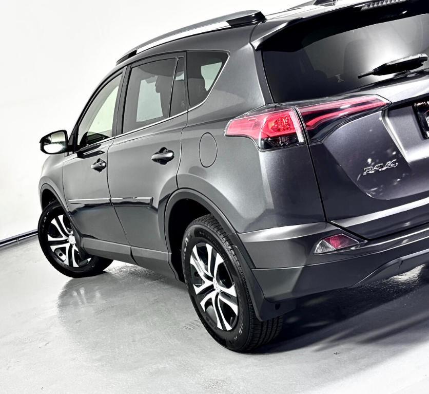 used 2018 Toyota RAV4 car, priced at $13,800