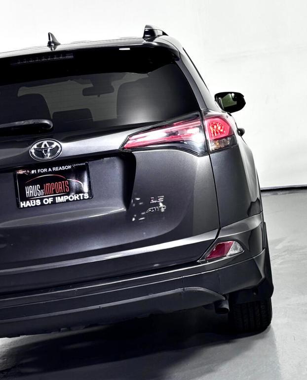 used 2018 Toyota RAV4 car, priced at $13,800