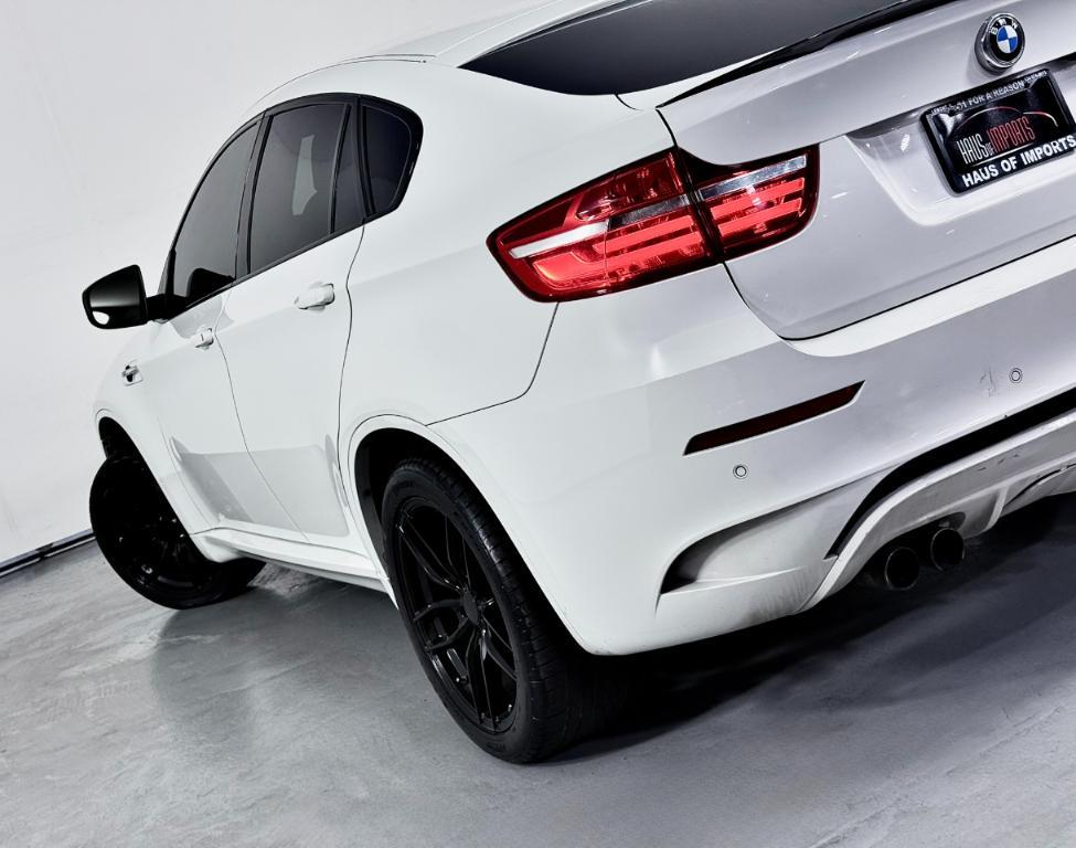 used 2013 BMW X6 M car, priced at $19,300