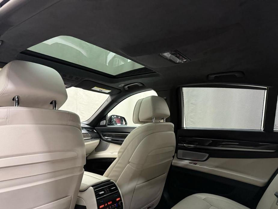 used 2015 BMW 750 car, priced at $18,900