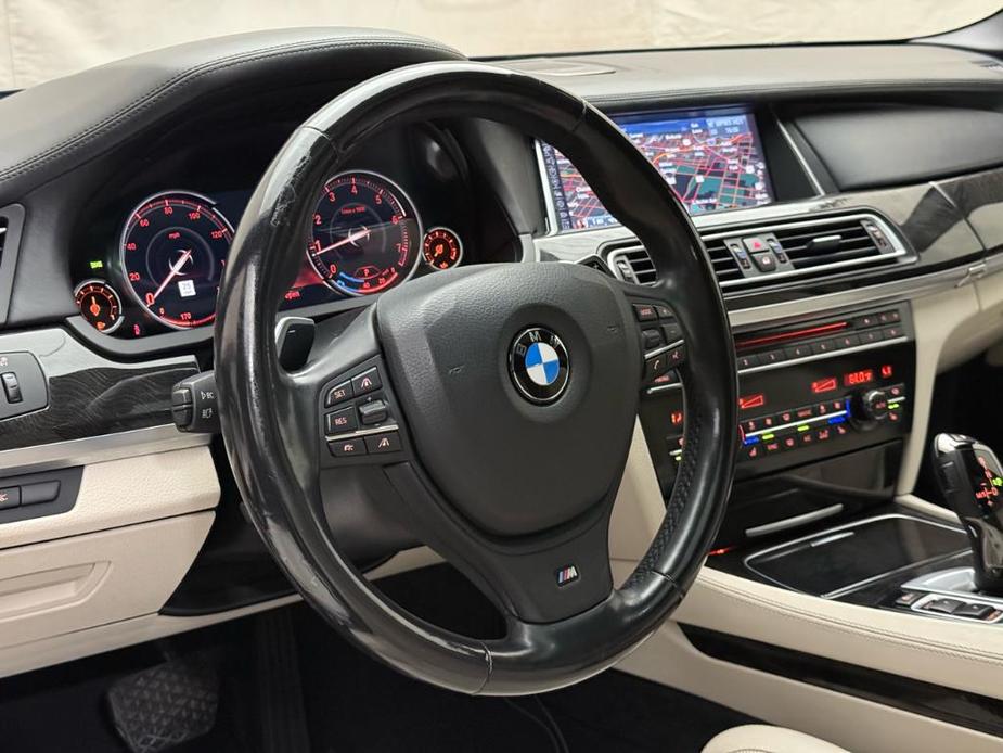 used 2015 BMW 750 car, priced at $18,900