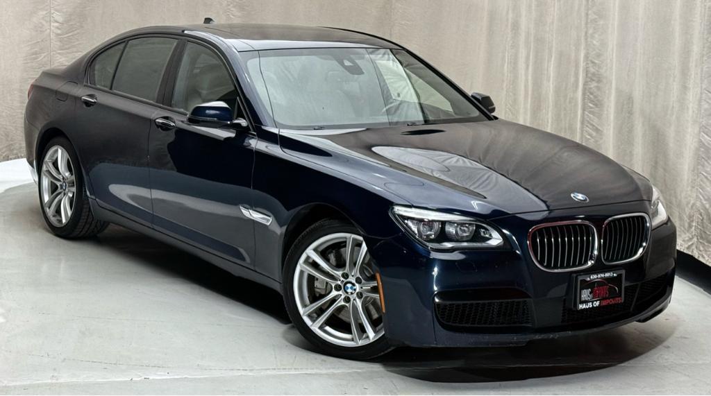 used 2015 BMW 750 car, priced at $18,900