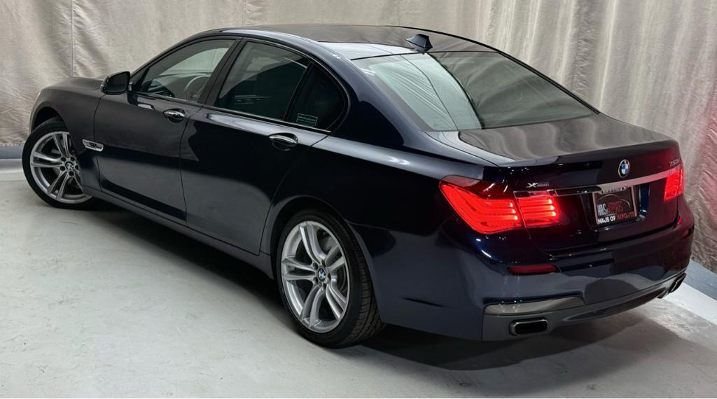 used 2015 BMW 750 car, priced at $18,900