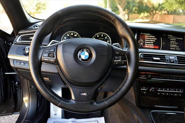 used 2015 BMW 750 car, priced at $19,999