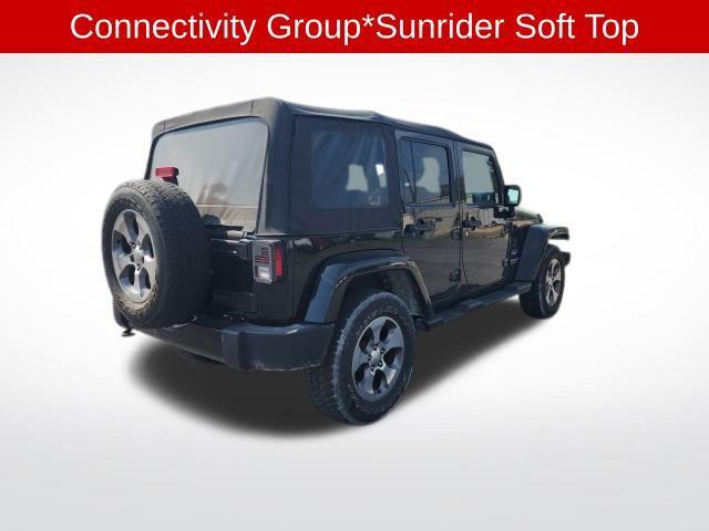 used 2016 Jeep Wrangler Unlimited car, priced at $23,200
