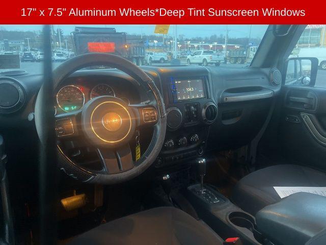 used 2015 Jeep Wrangler Unlimited car, priced at $16,200