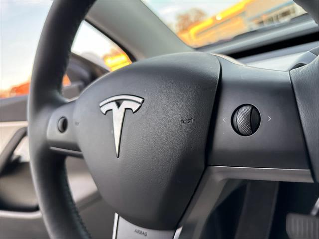 used 2021 Tesla Model Y car, priced at $29,795