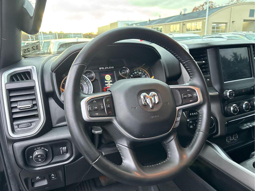 used 2021 Ram 1500 car, priced at $31,371