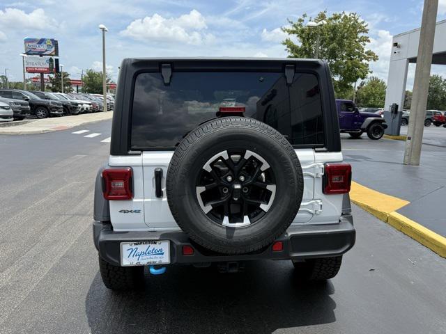 used 2024 Jeep Wrangler 4xe car, priced at $36,104