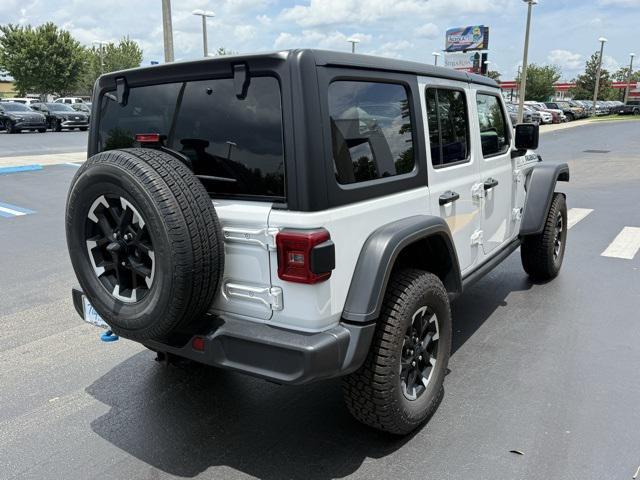 used 2024 Jeep Wrangler 4xe car, priced at $36,104