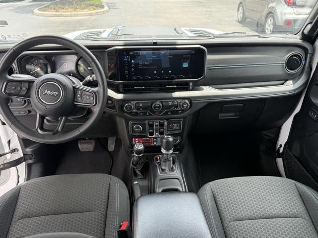used 2024 Jeep Wrangler 4xe car, priced at $36,104