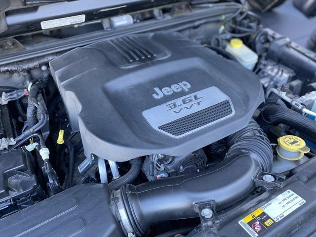 used 2013 Jeep Wrangler Unlimited car, priced at $17,834