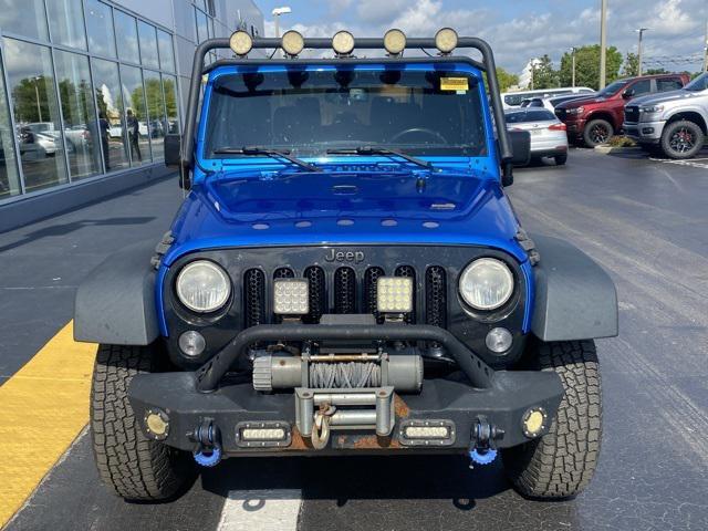 used 2015 Jeep Wrangler car, priced at $16,033
