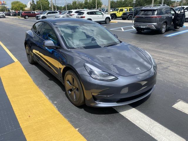 used 2023 Tesla Model 3 car, priced at $23,297