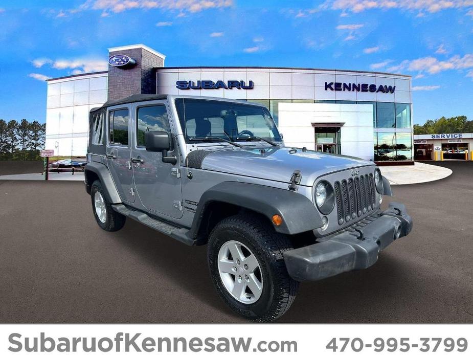 used 2015 Jeep Wrangler Unlimited car, priced at $18,977