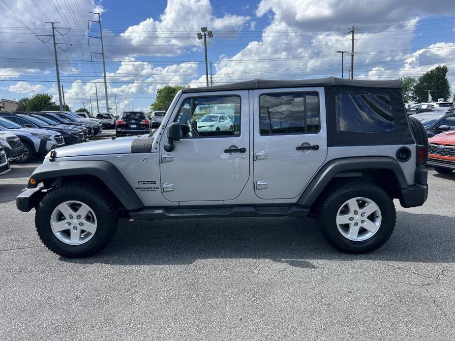 used 2015 Jeep Wrangler Unlimited car, priced at $16,744