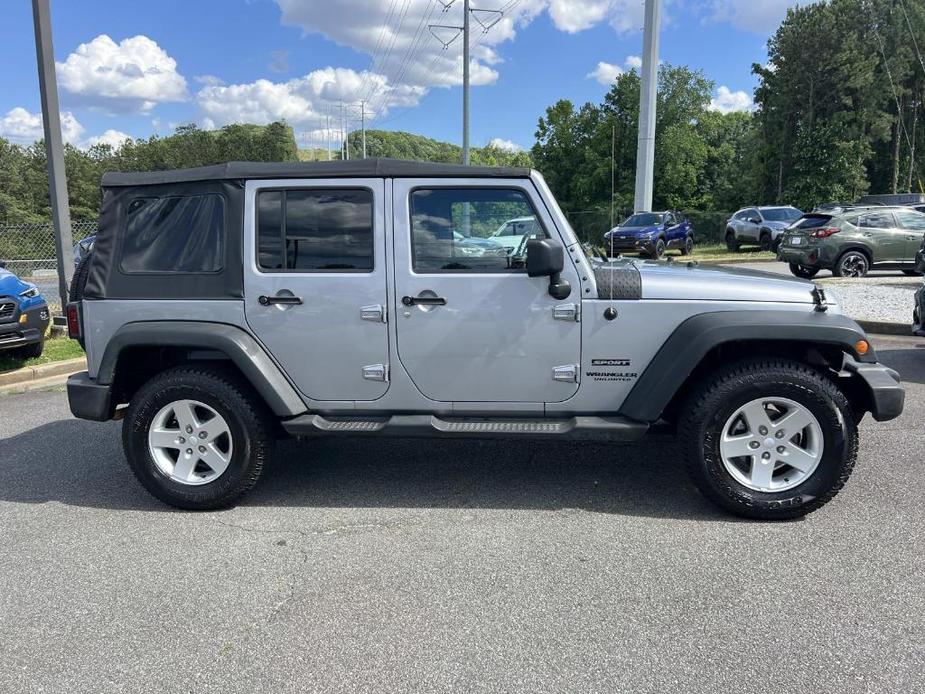 used 2015 Jeep Wrangler Unlimited car, priced at $16,744