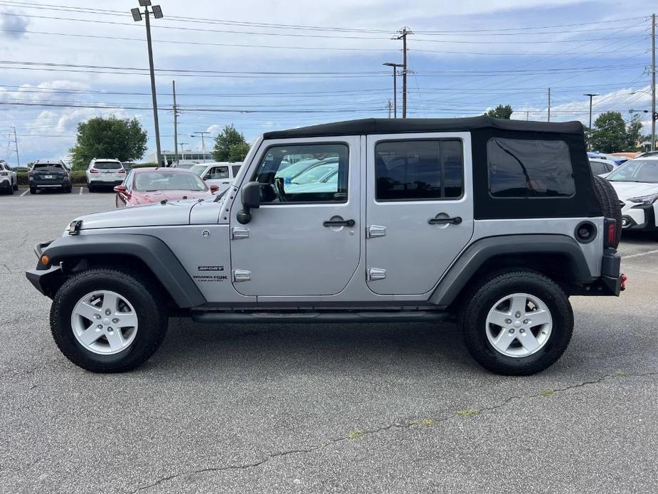 used 2018 Jeep Wrangler JK Unlimited car, priced at $23,977