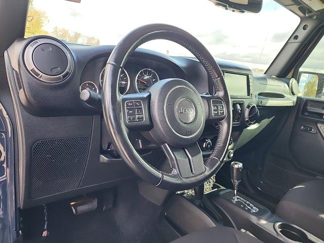 used 2017 Jeep Wrangler Unlimited car, priced at $23,076