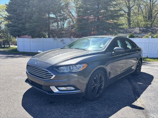 used 2018 Ford Fusion car, priced at $12,790