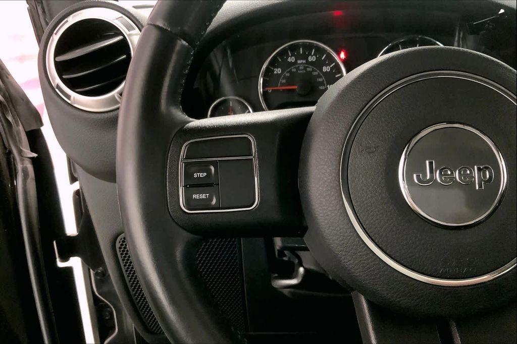 used 2018 Jeep Wrangler JK Unlimited car, priced at $20,890