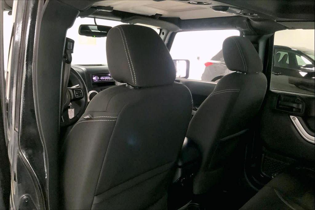 used 2018 Jeep Wrangler JK Unlimited car, priced at $20,890