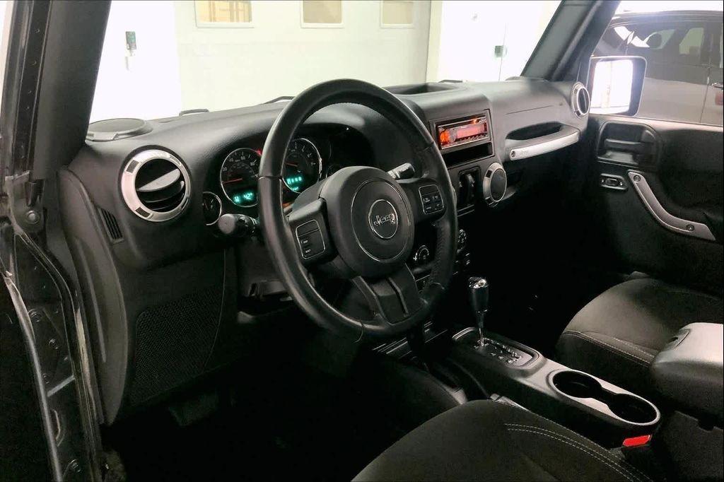 used 2018 Jeep Wrangler JK Unlimited car, priced at $20,890