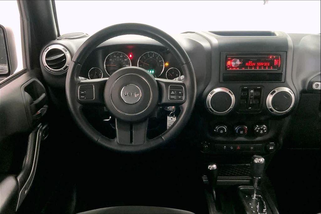 used 2018 Jeep Wrangler JK Unlimited car, priced at $20,890