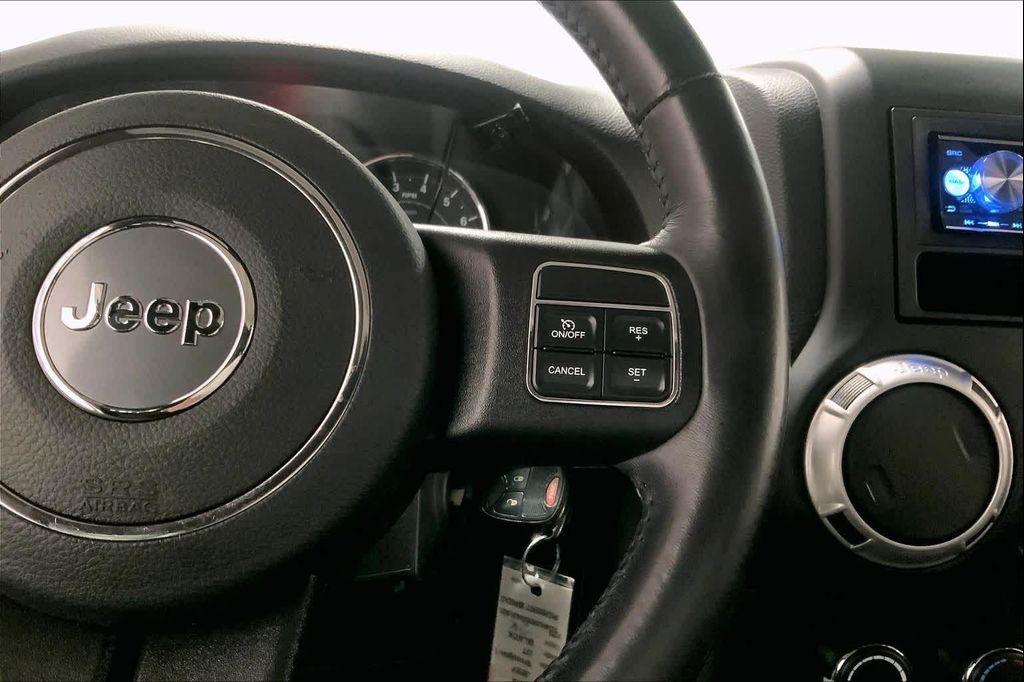 used 2018 Jeep Wrangler JK Unlimited car, priced at $20,890