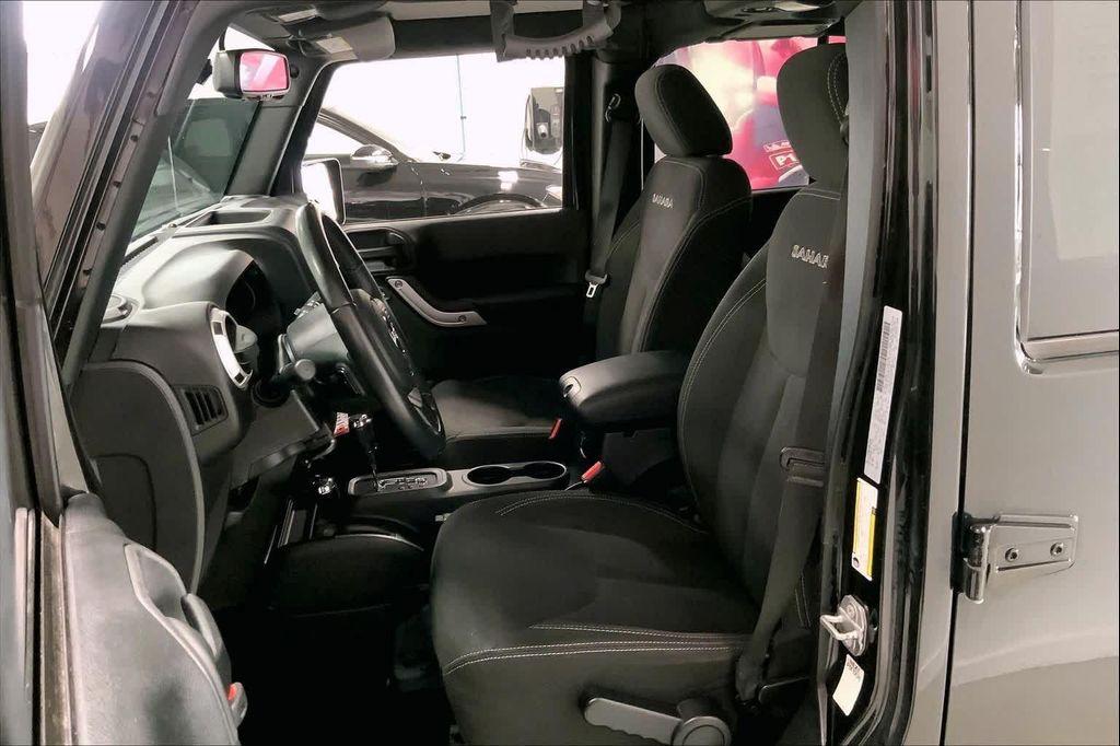 used 2018 Jeep Wrangler JK Unlimited car, priced at $20,890