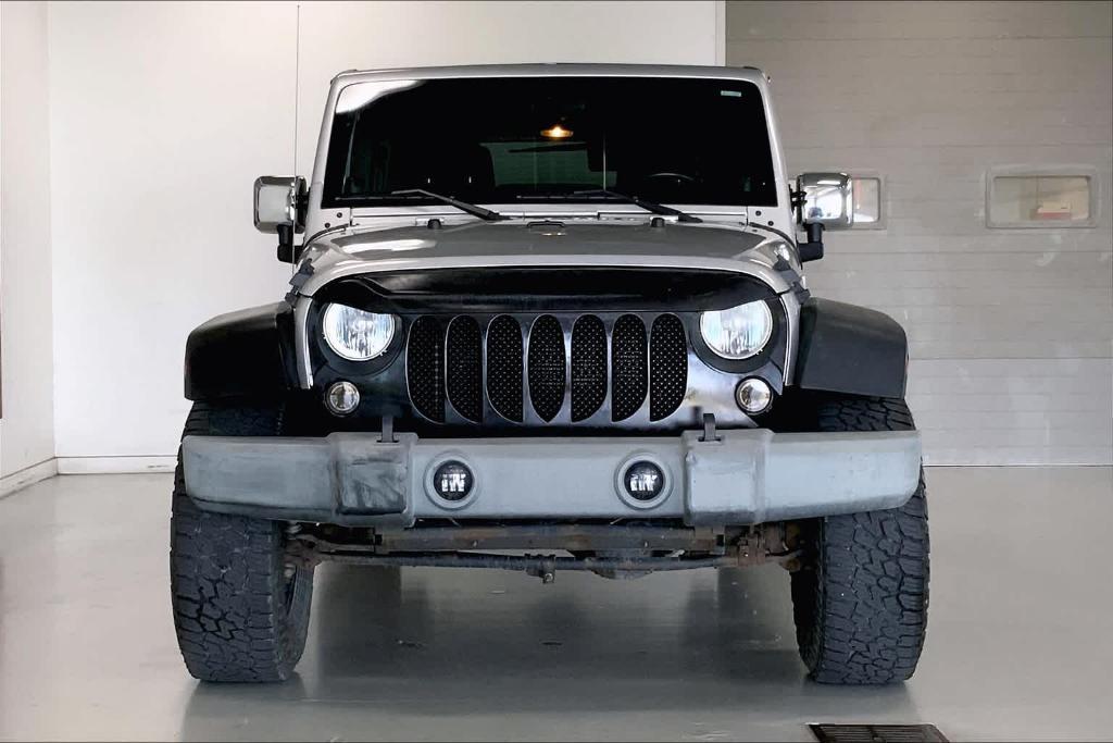 used 2012 Jeep Wrangler Unlimited car, priced at $11,690